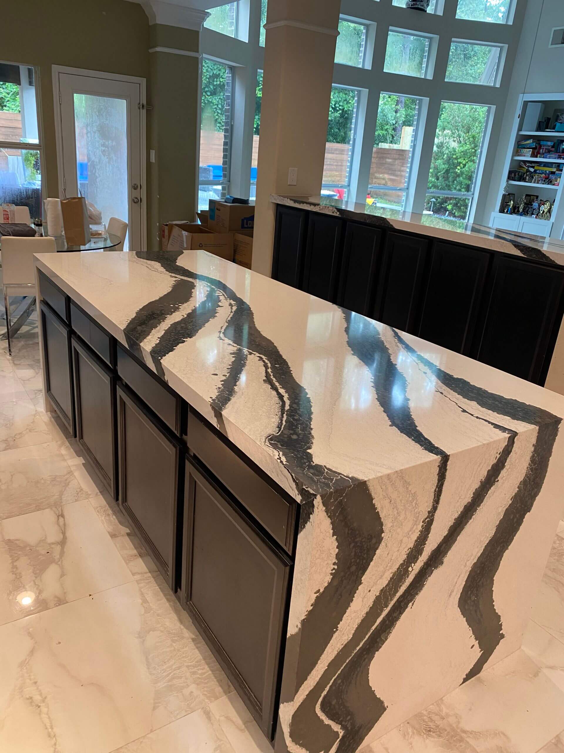 A kitchen counter with white and black lining